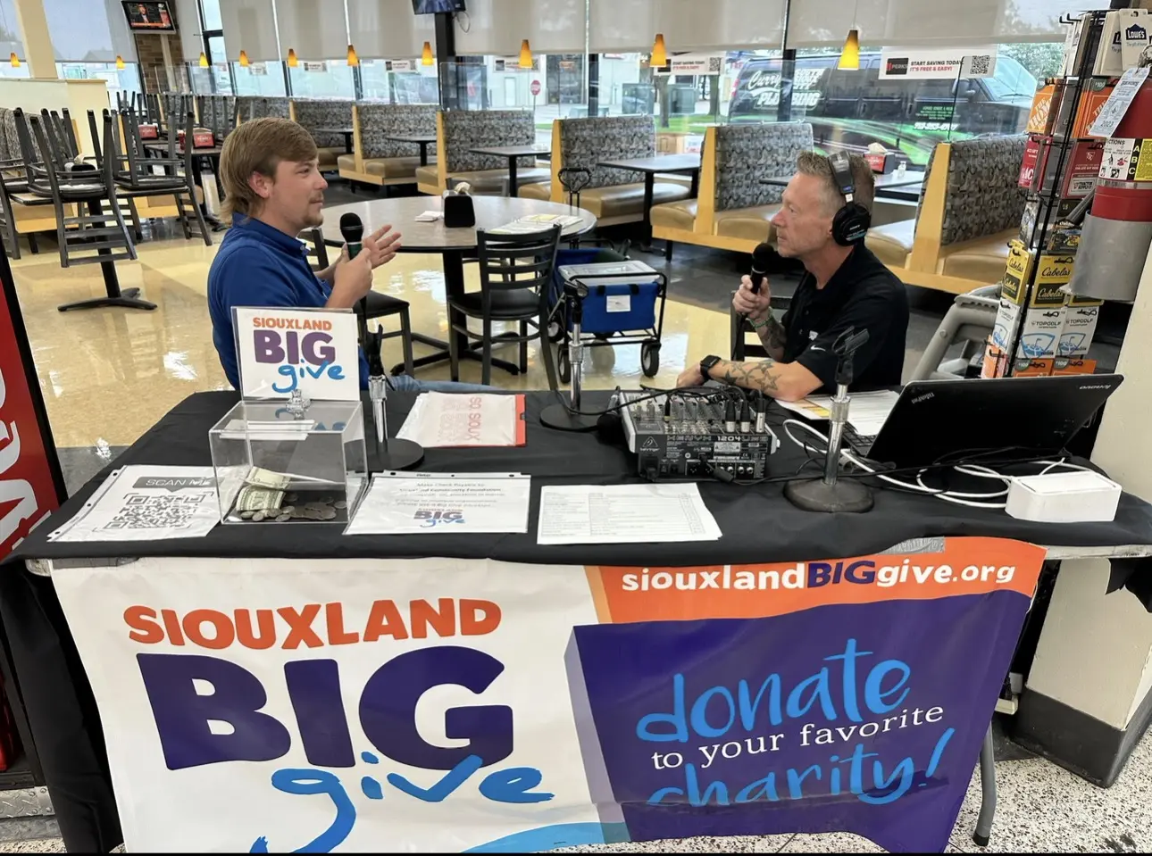 Braden Hansen discussing Housing American Heroes on the radio during the annual Siouxland Big Give