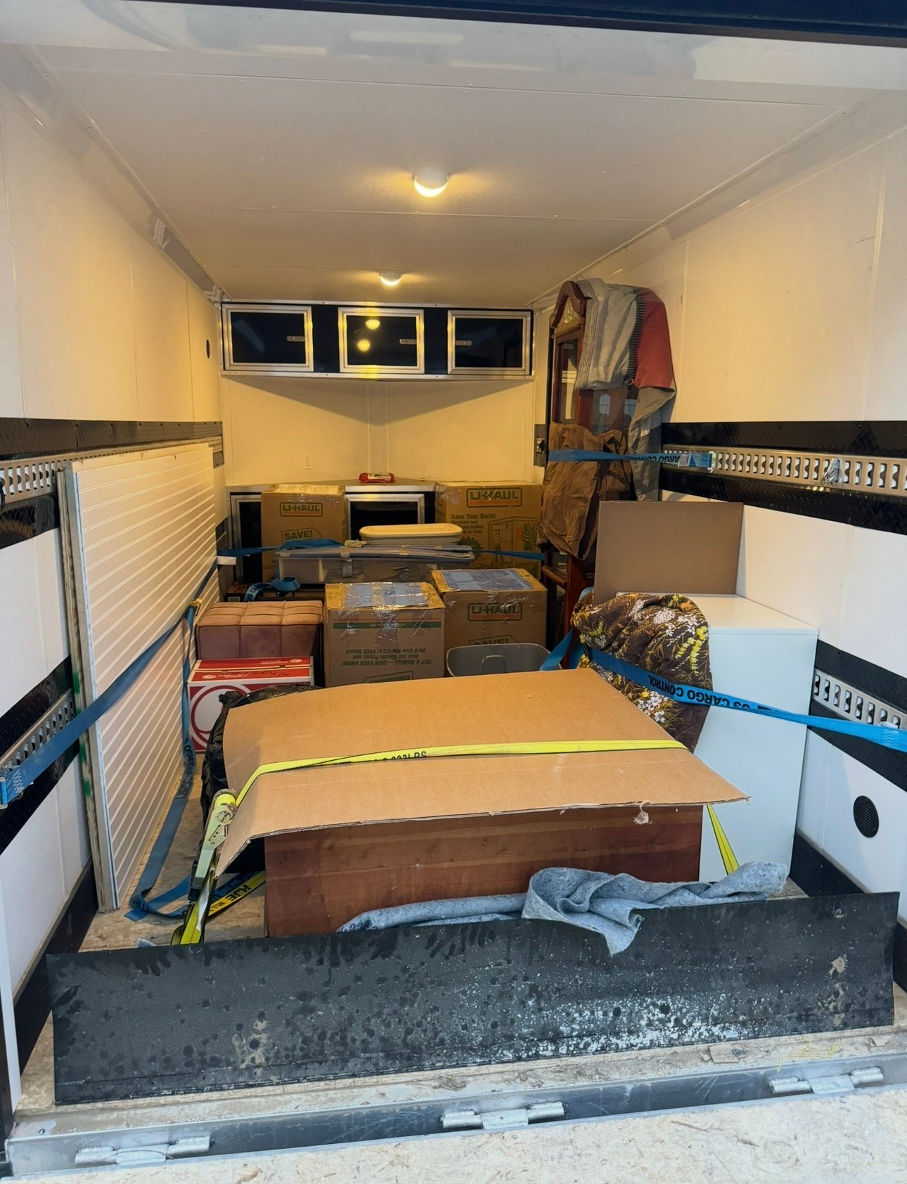 Trailer loaded with a seller's belongings during a CashOffers4Houses move-out
